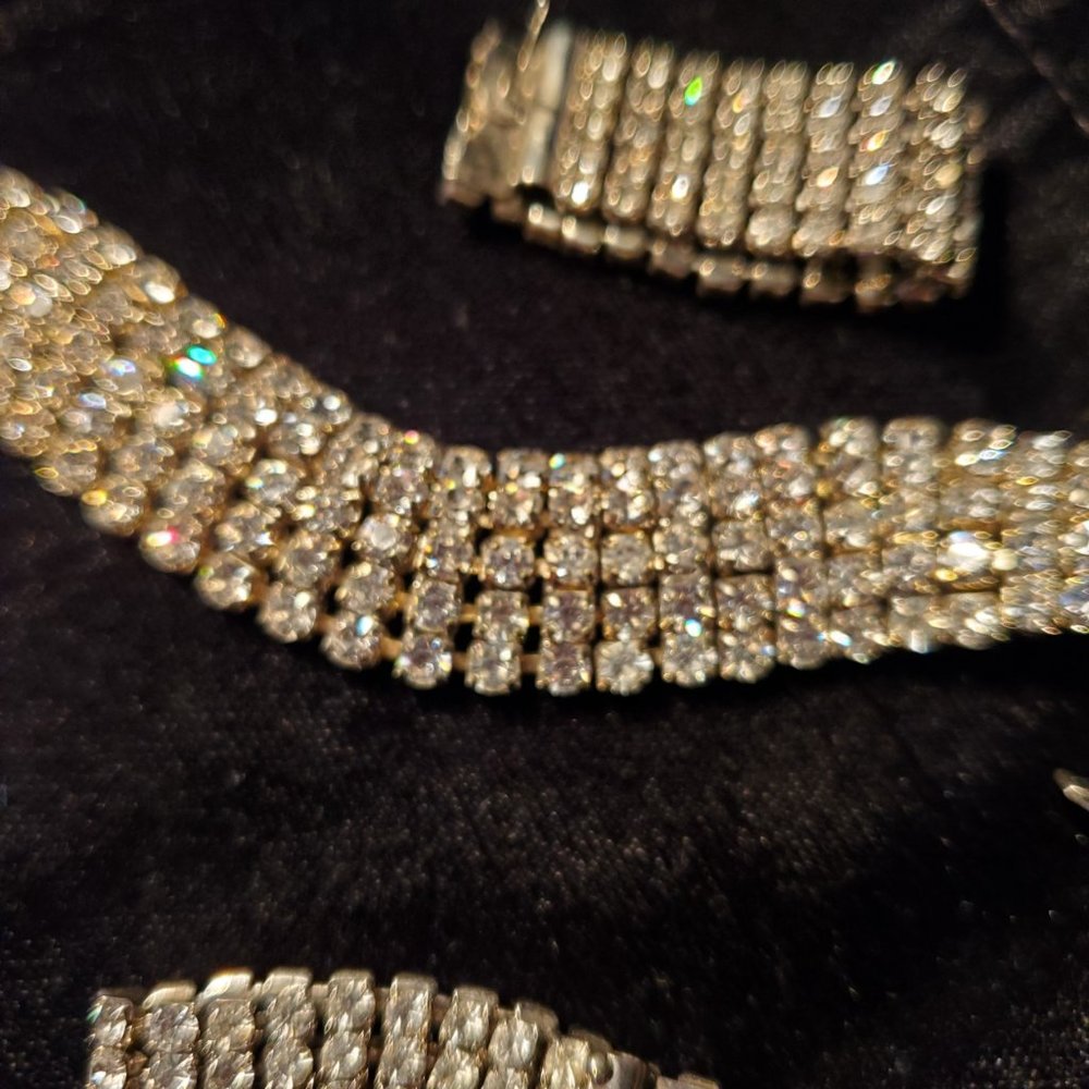 quadruple strand rhinestone bracelet and matching pierced rhinestones earrings